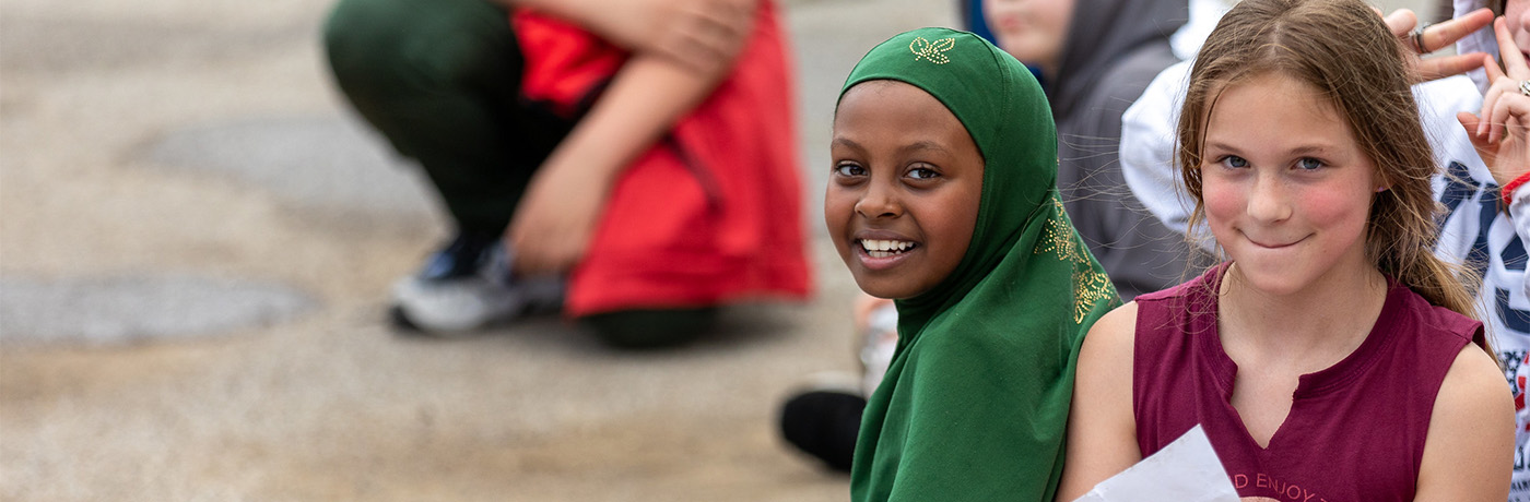 two students smiling